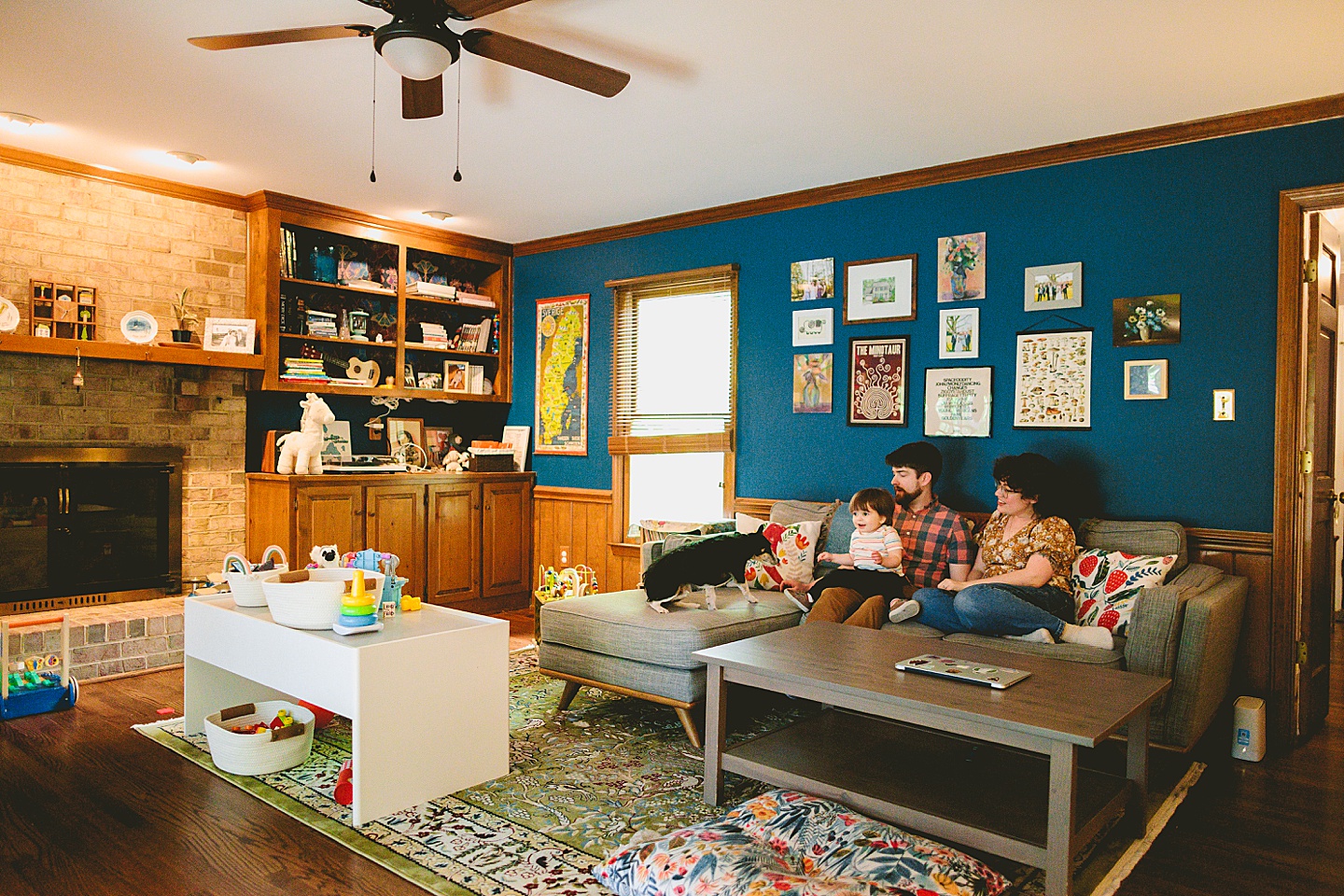 Family sitting on the couch in their living room