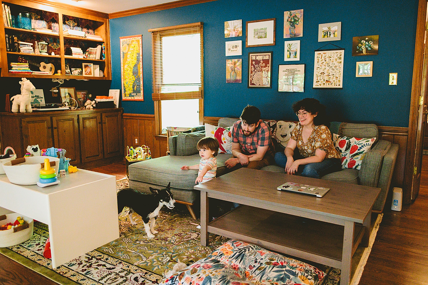 Family sitting on the couch in their living room