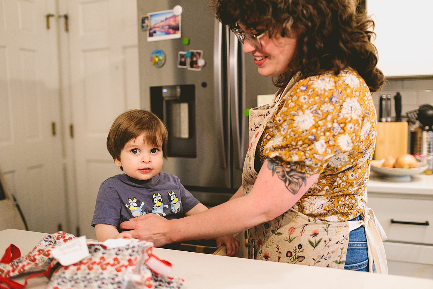 Toddler helps make brownies with parents