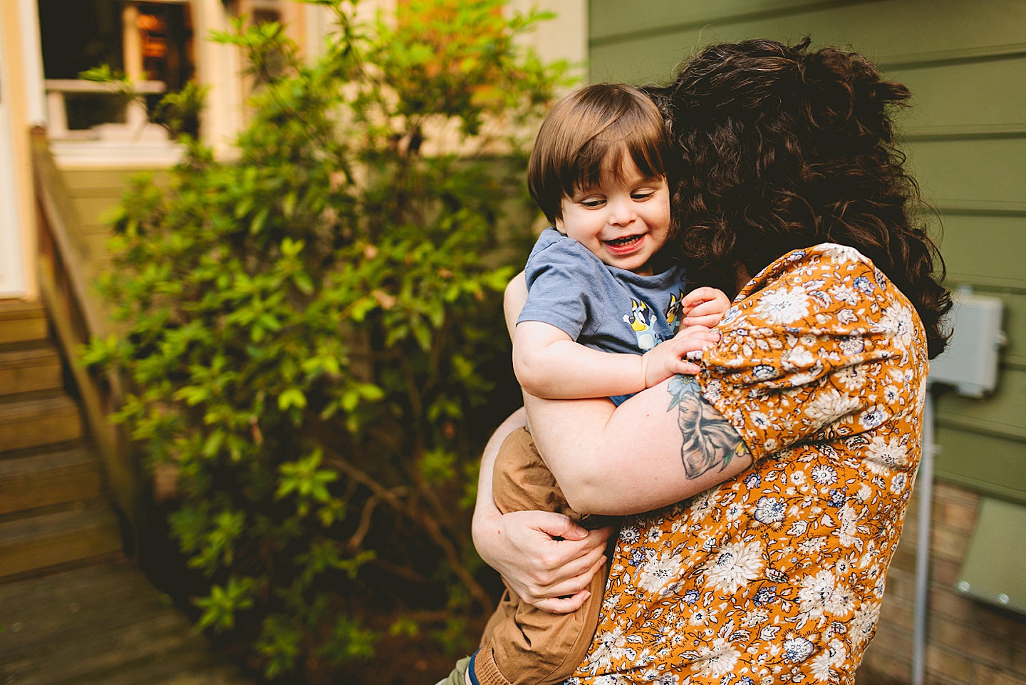 Mom gives toddler a hug