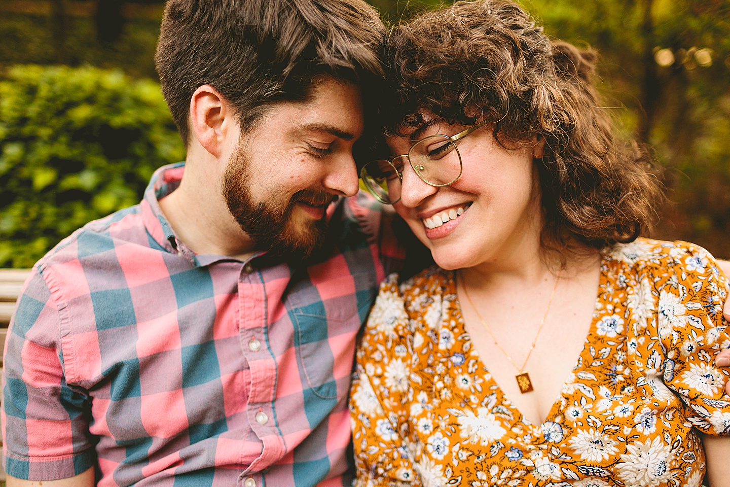 Close-up portrait of couple with heads together