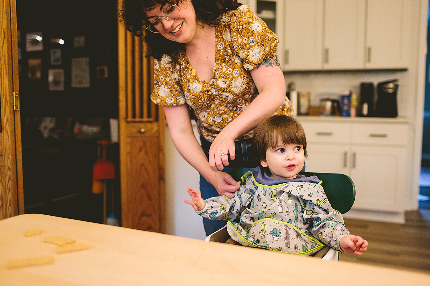 Kid getting ready to eat with jacket