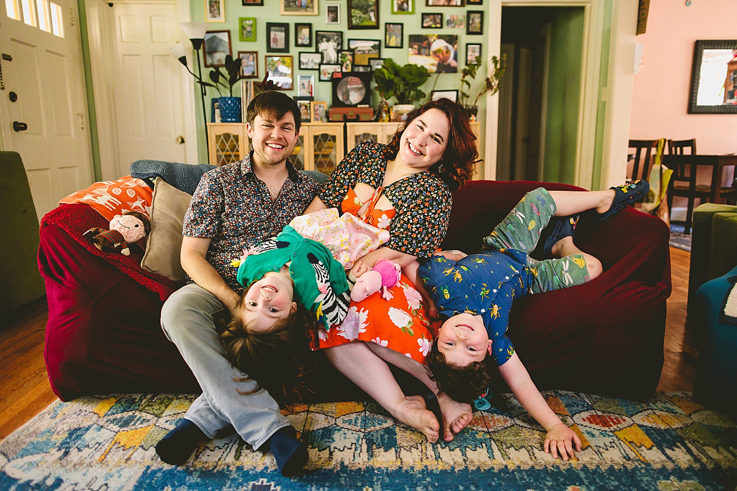 Family portraits on couch in Durham