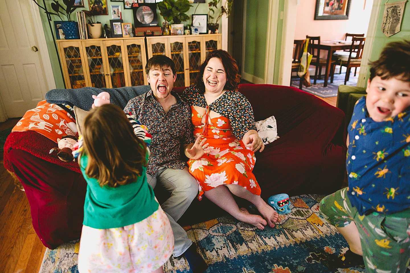 Family portraits on couch in Durham