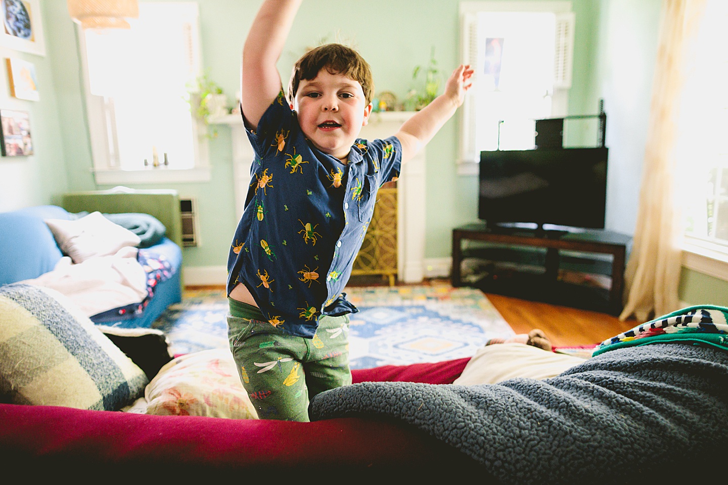 Family dancing around living room