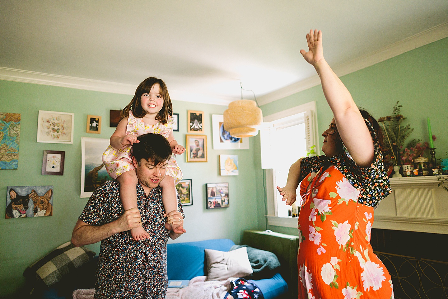 Family dancing around living room