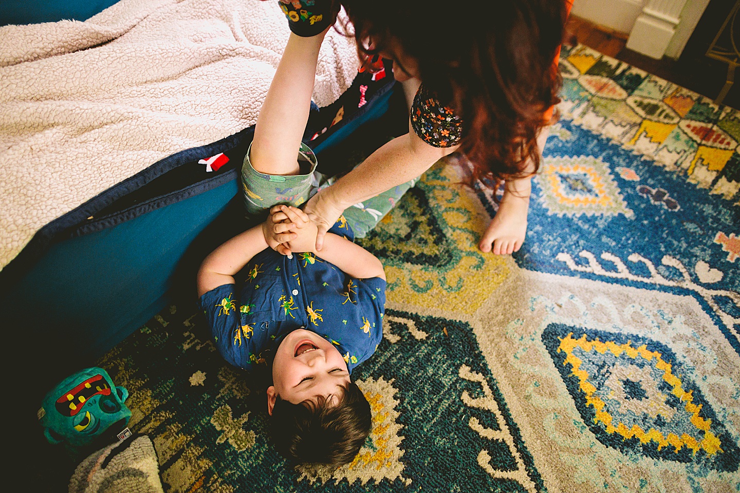 Family dancing around living room