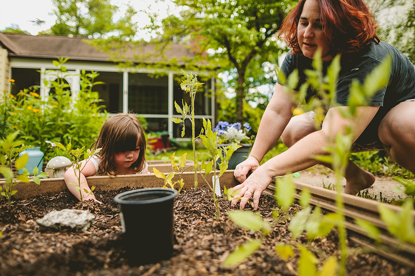 Family gardening in Durham NC during photos