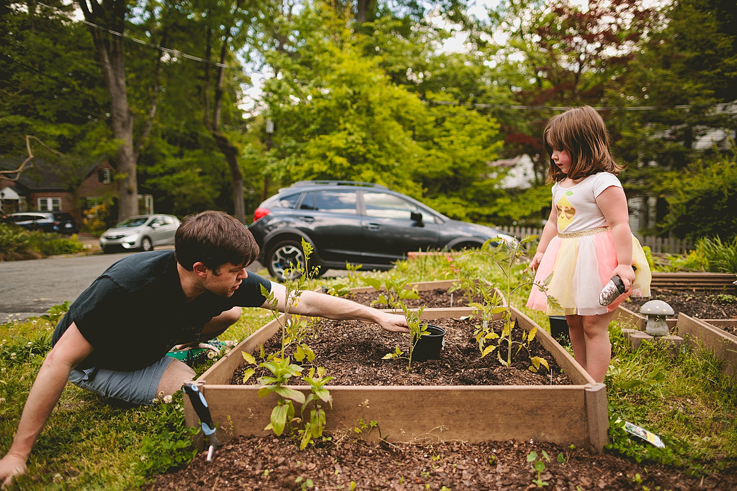Family gardening in Durham NC during photos