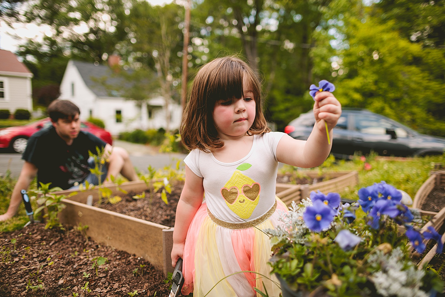 Family gardening in Durham NC during photos