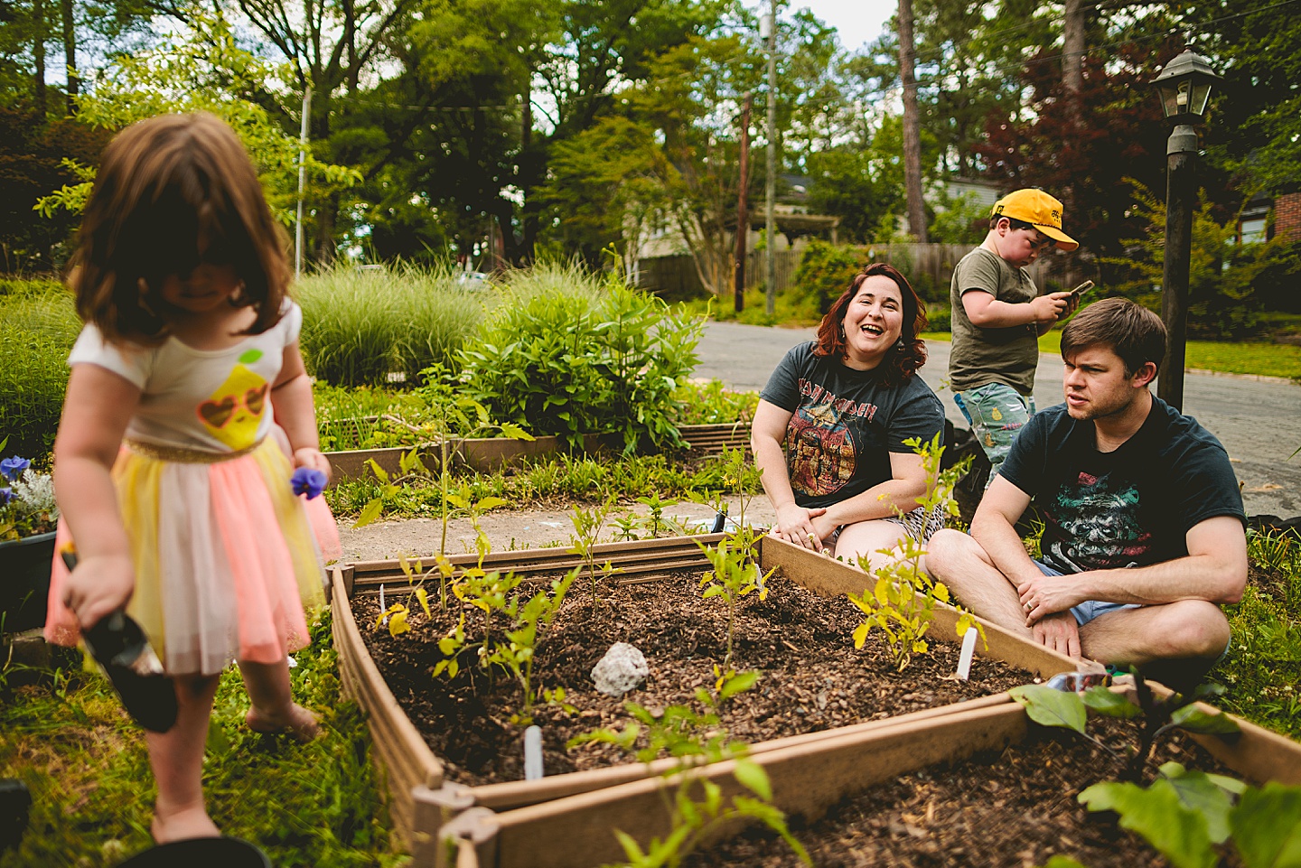 Family gardening in Durham NC during photos