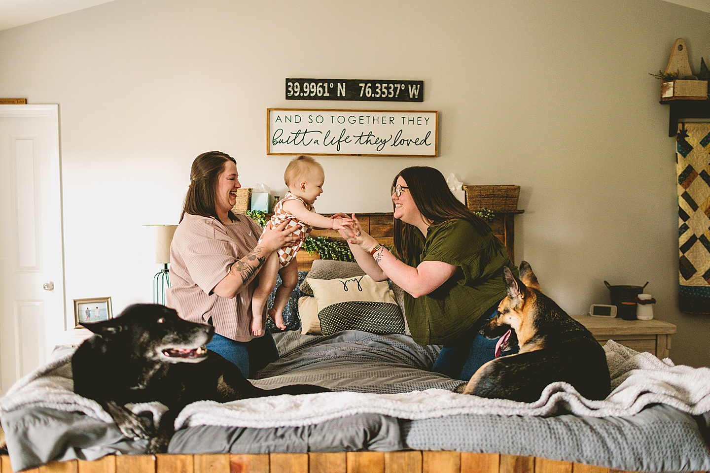 Couple with a one year old baby and two dogs