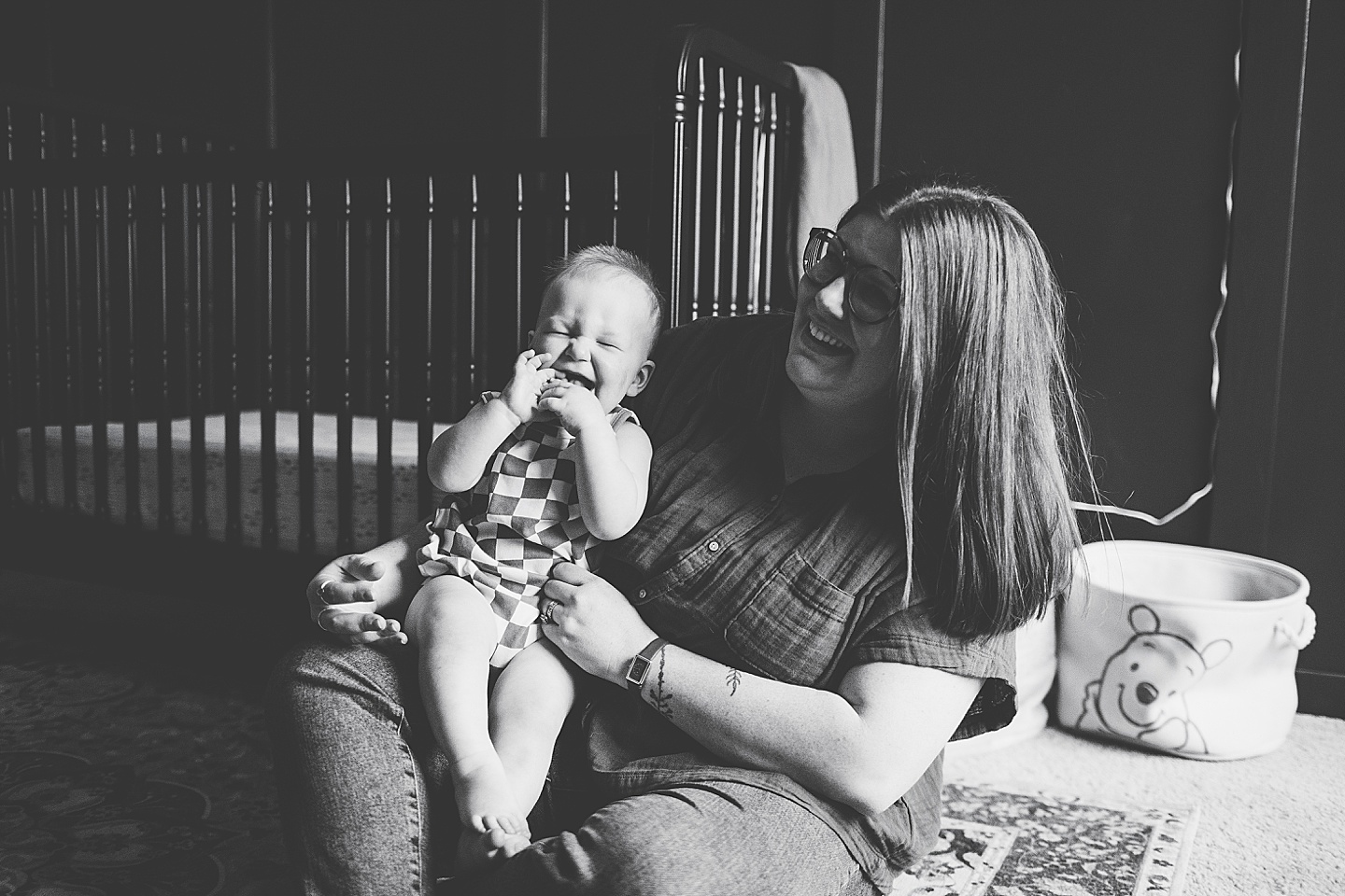 Black and white photo of baby smiling
