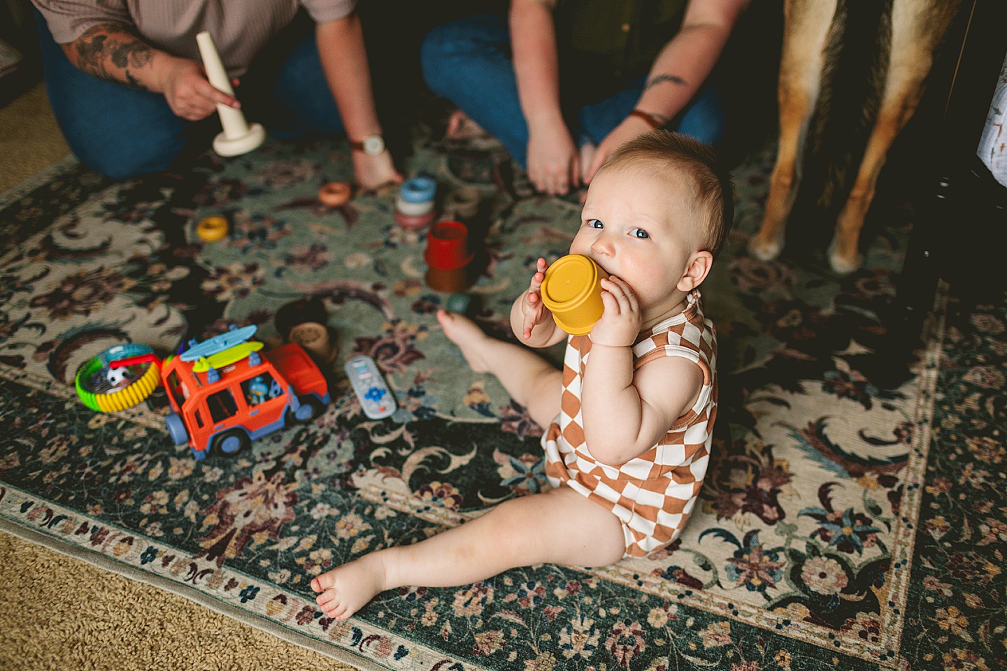 Baby holding a cup