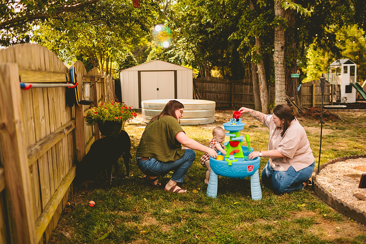 Baby using water table outside