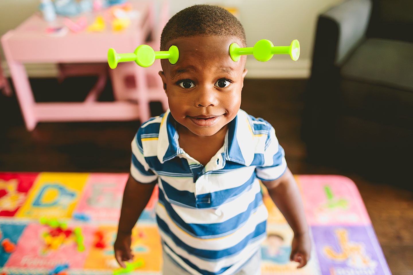 Kid wearing alien antennae