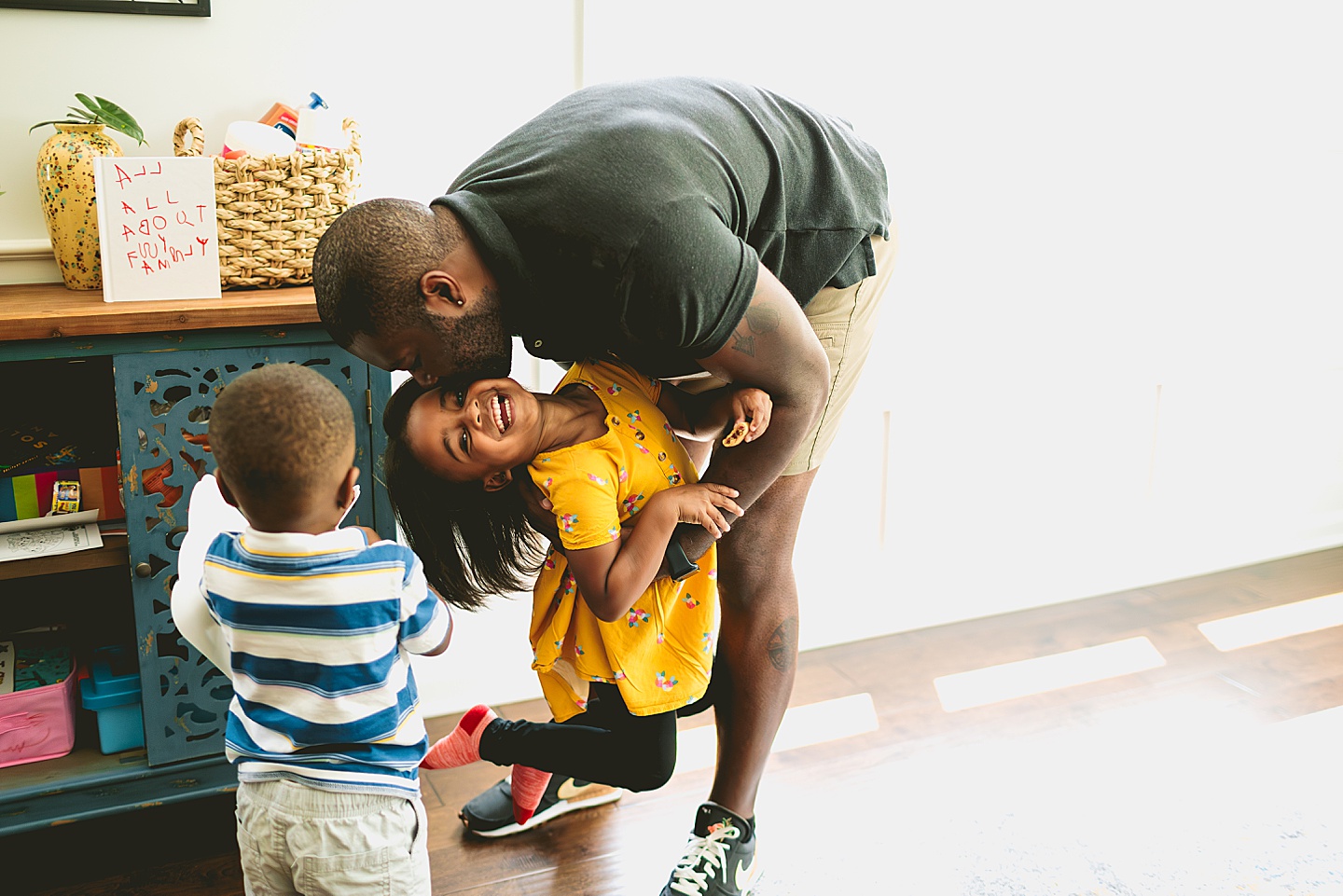 Dad hanging out with kids at home