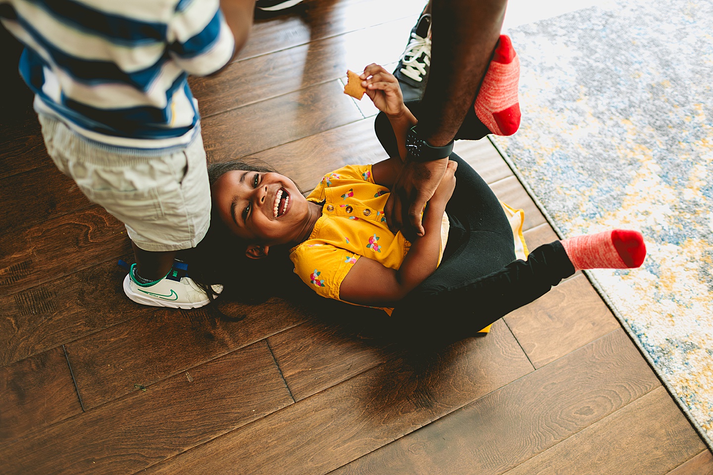 Girl laughing on the floor