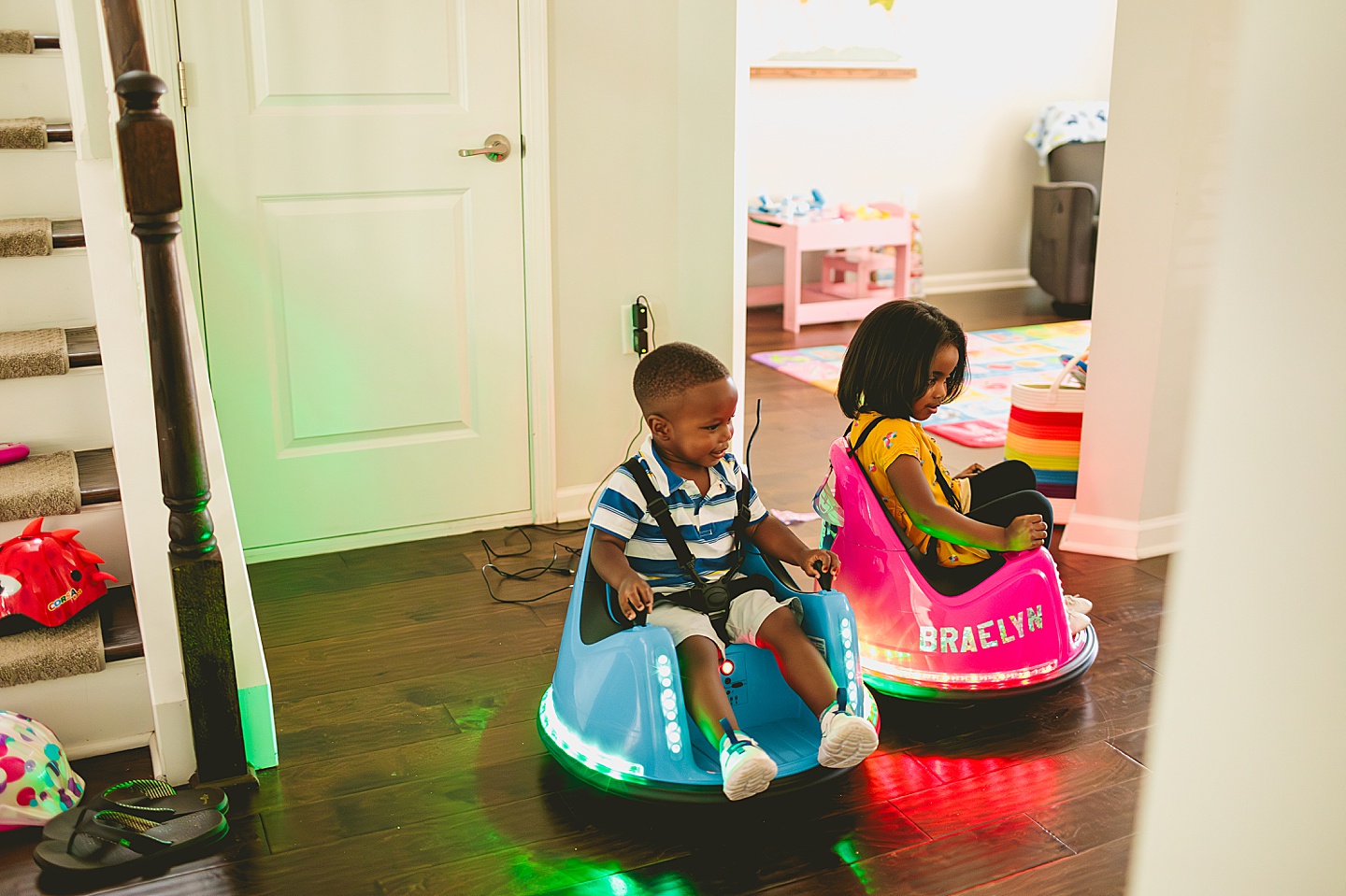 Kids riding go karts in the house