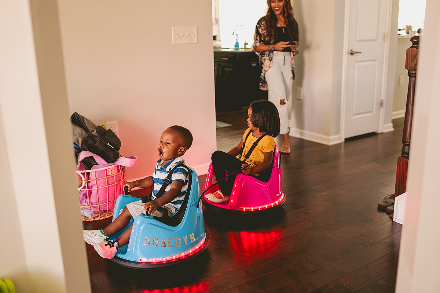 Kids riding go karts in the house