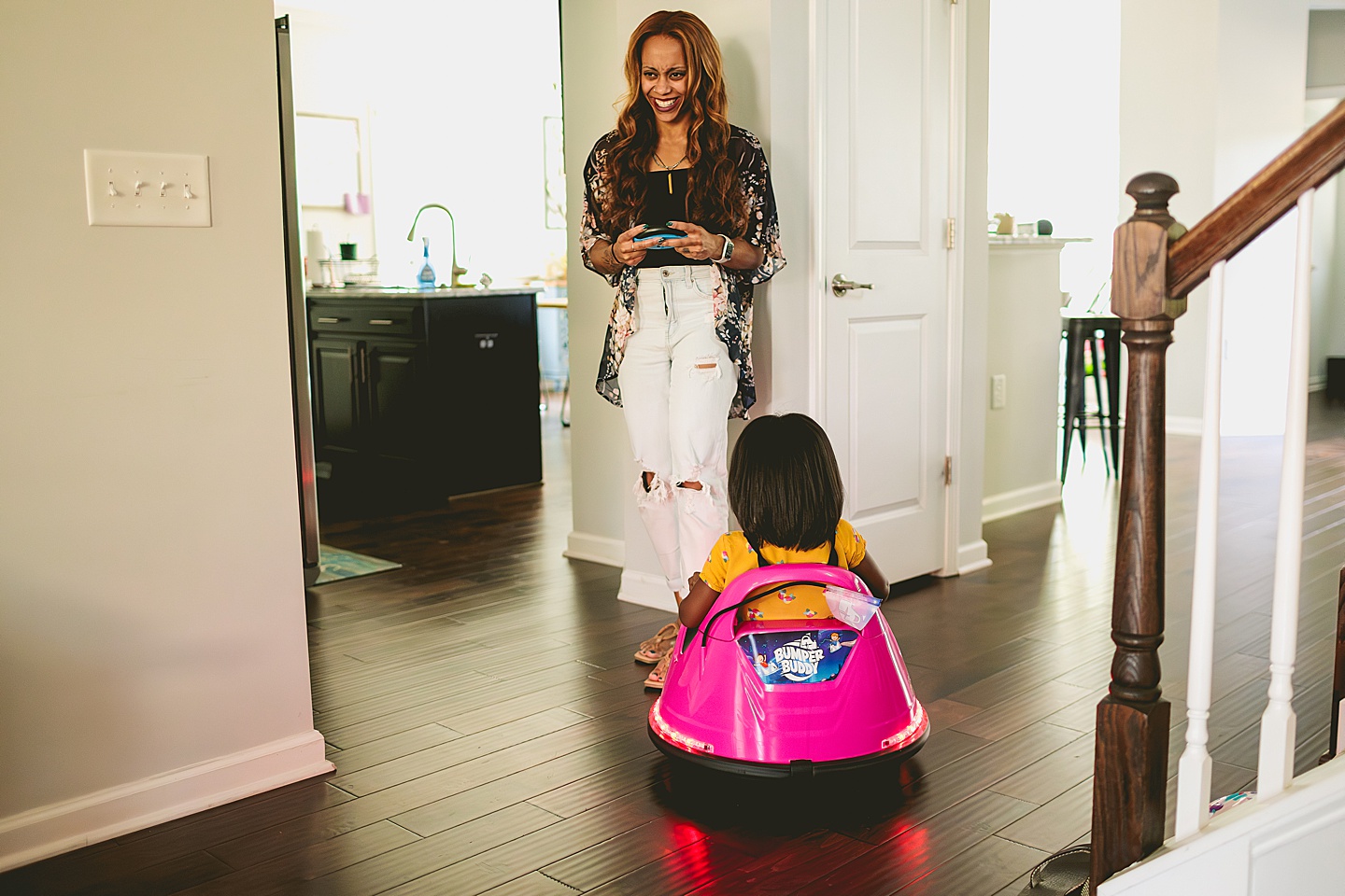 Kids riding go karts in the house