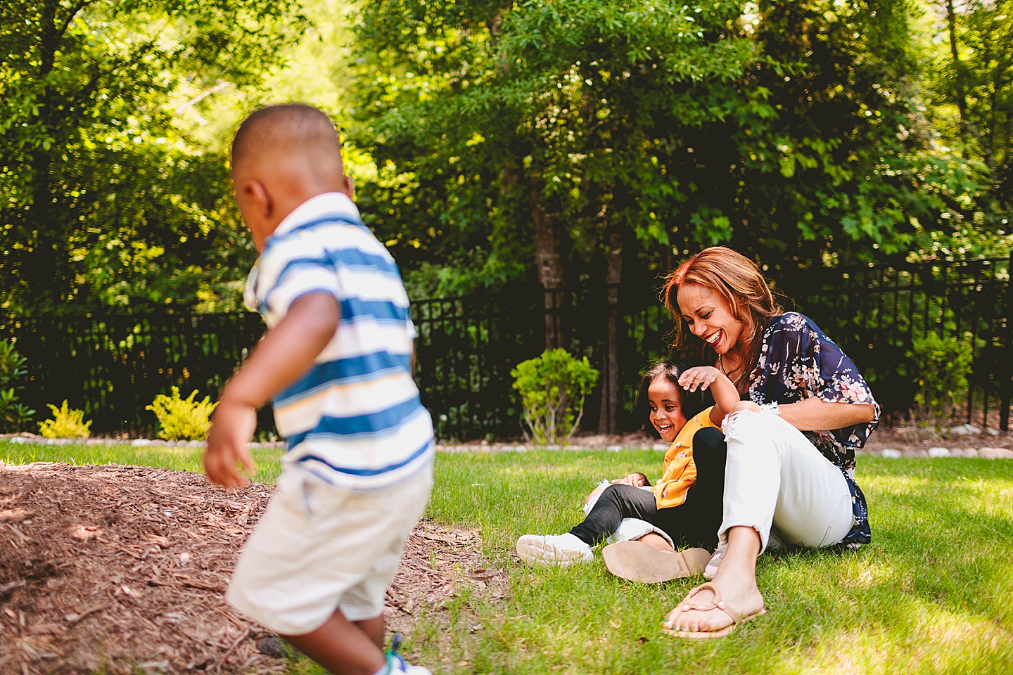 Kid and mom laughing