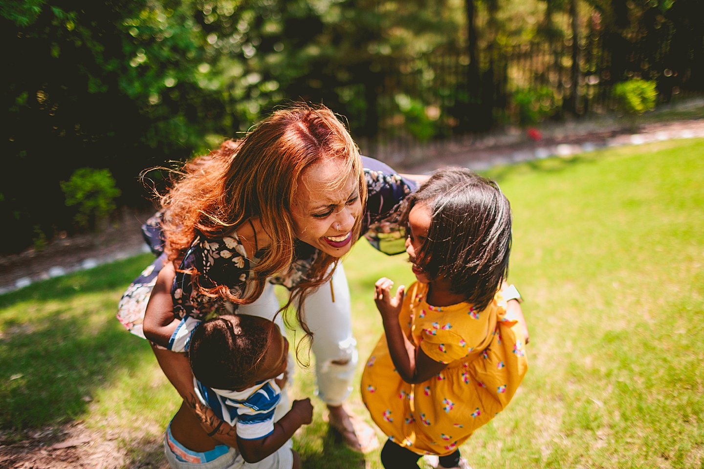 Mom laughing with kids