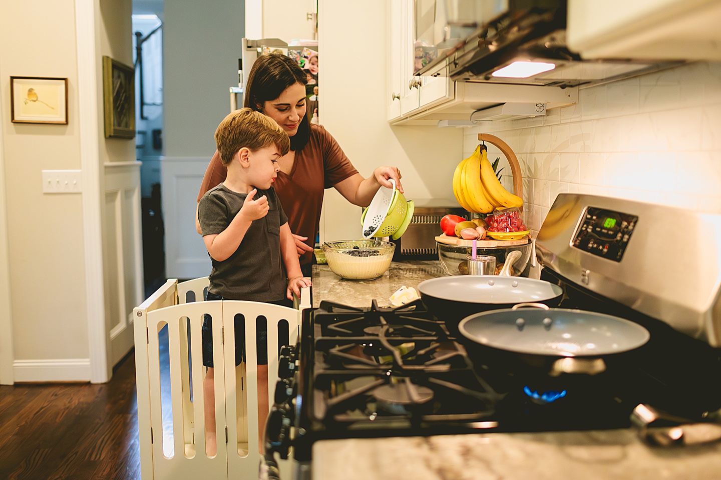 Family making breakfast in kitchen together