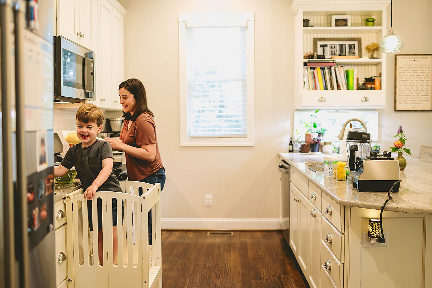 Family making breakfast in kitchen together