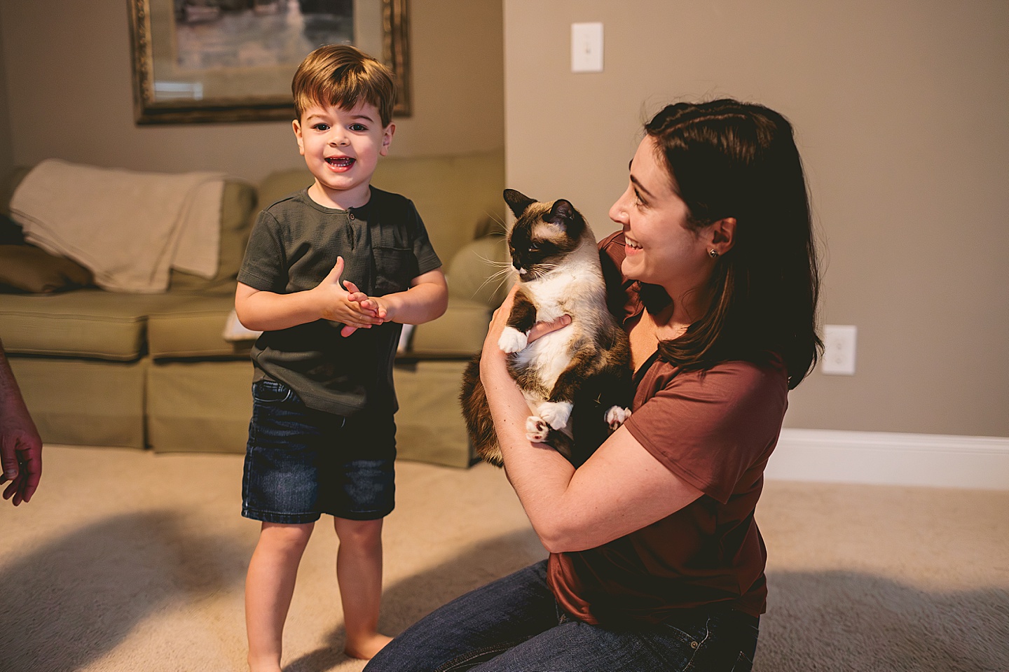 Family cat comes out of hiding for a few family pictures