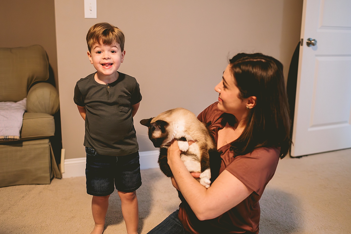 Family cat comes out of hiding for a few family pictures