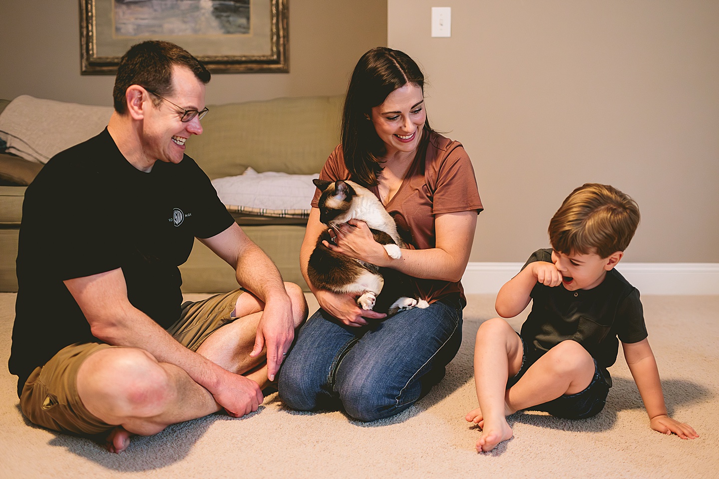 Family cat comes out of hiding for a few family pictures