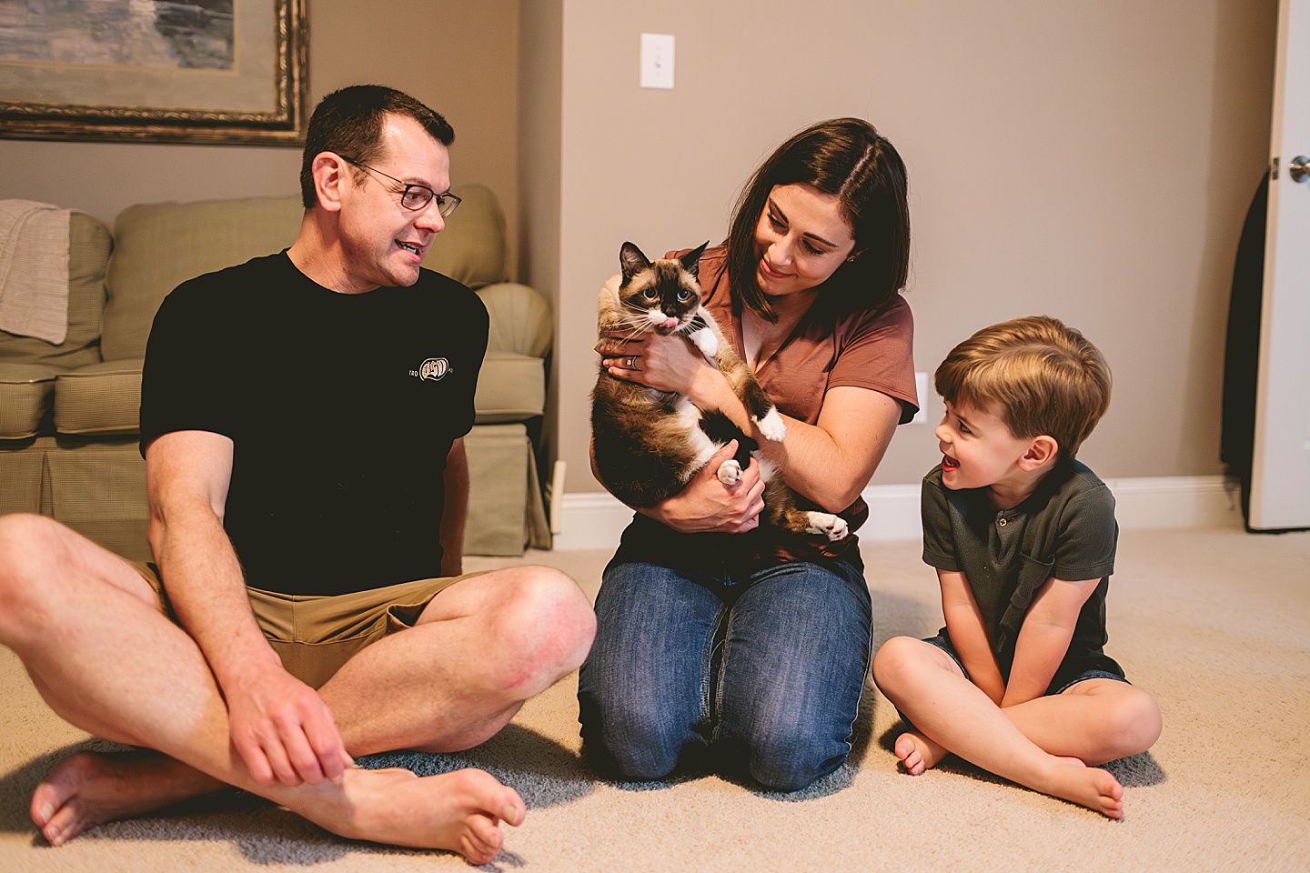 Family cat comes out of hiding for a few family pictures