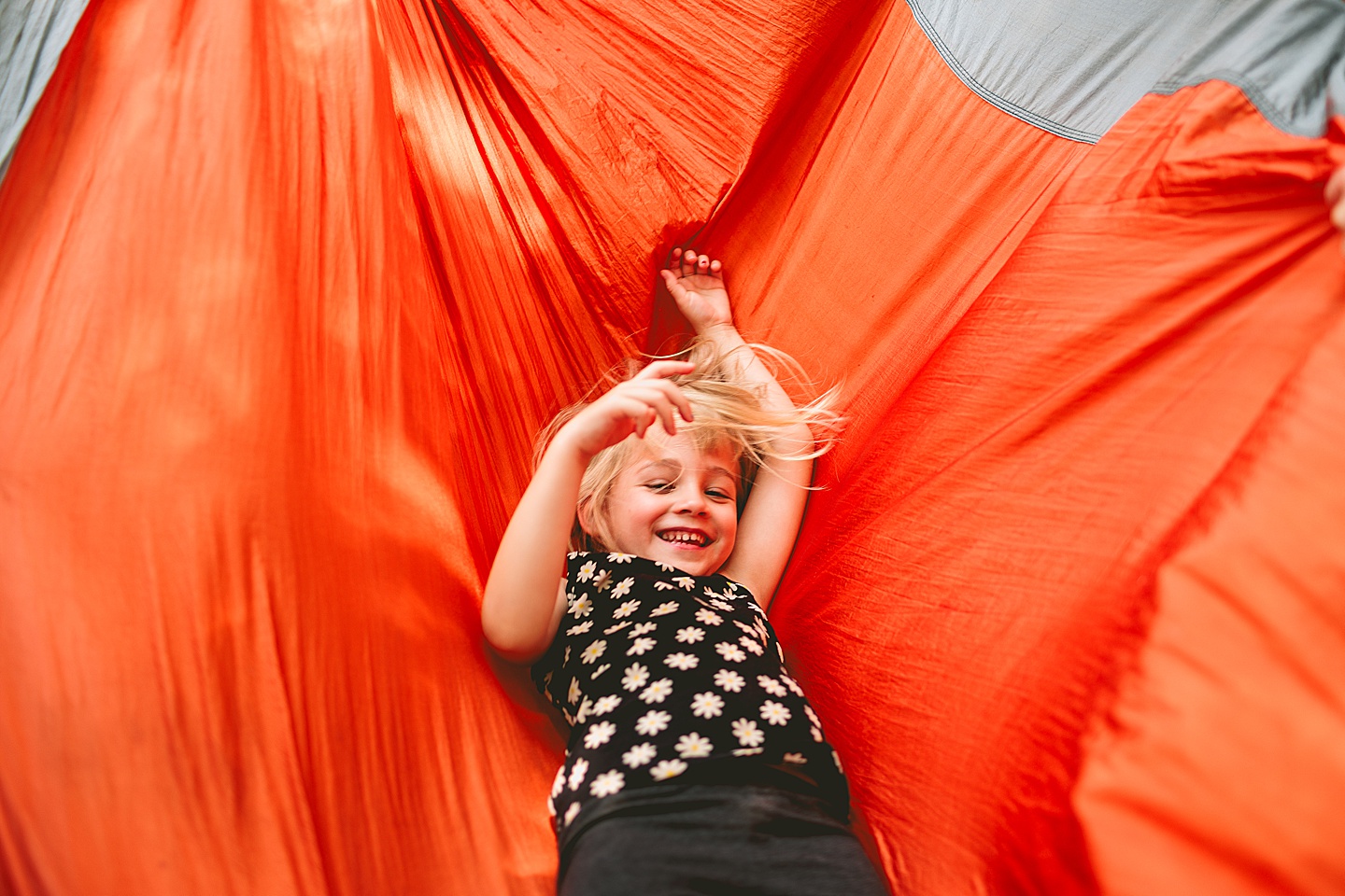 Girl laying on hammock