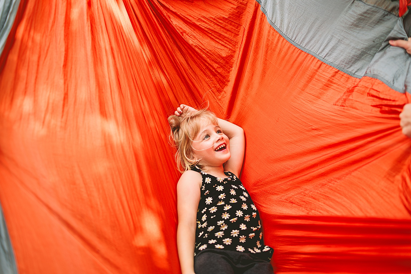 Girl laying on hammock