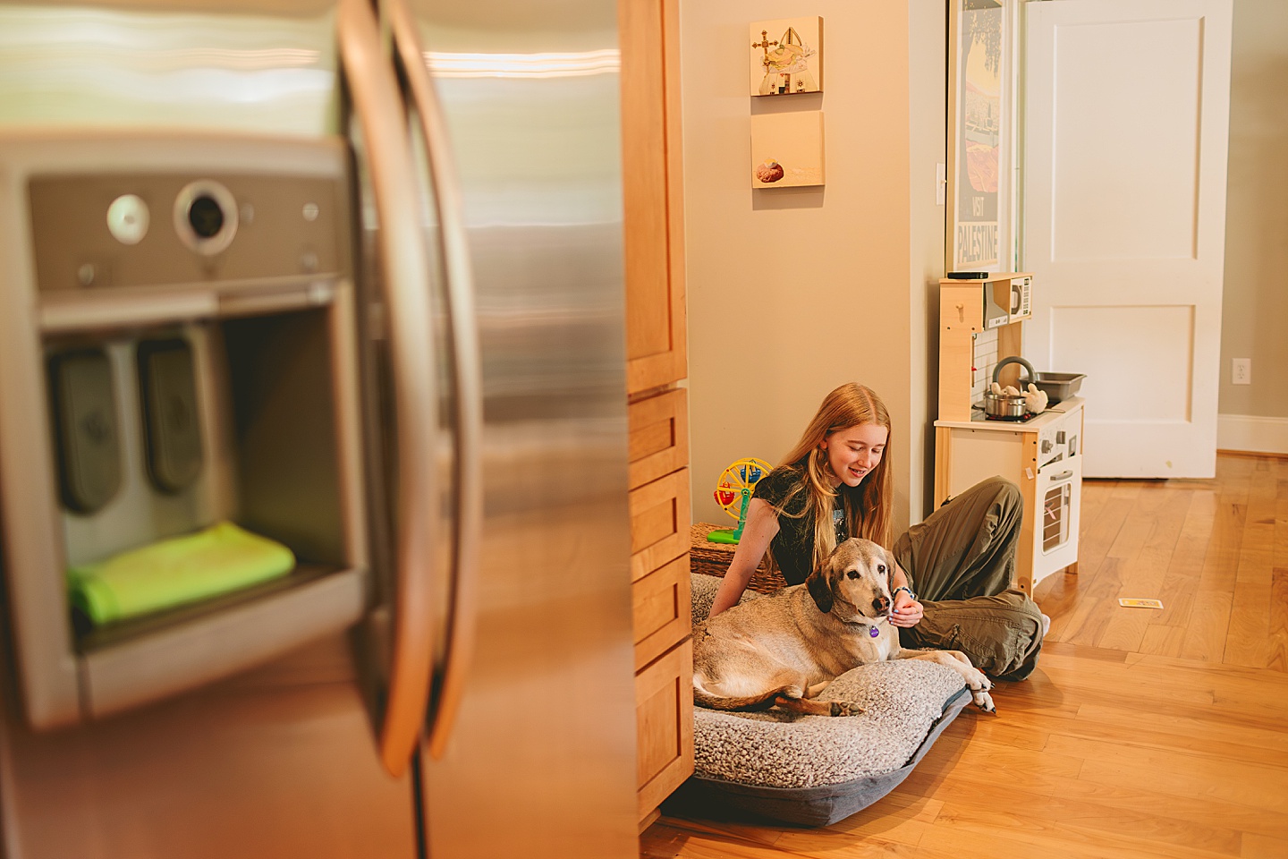 Girl sitting with dog