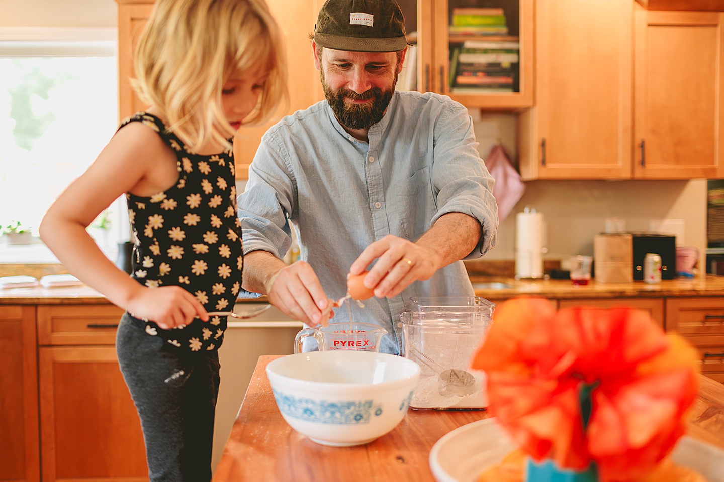 Child baking with Dad