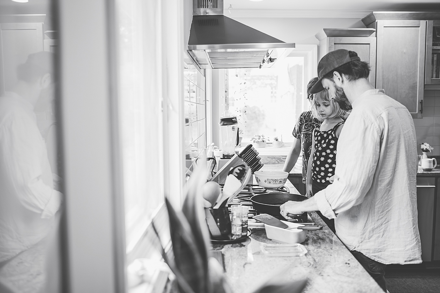 Family baking in kitchen