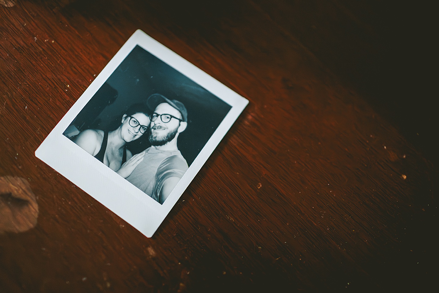 Black and white polaroid selfie of couple
