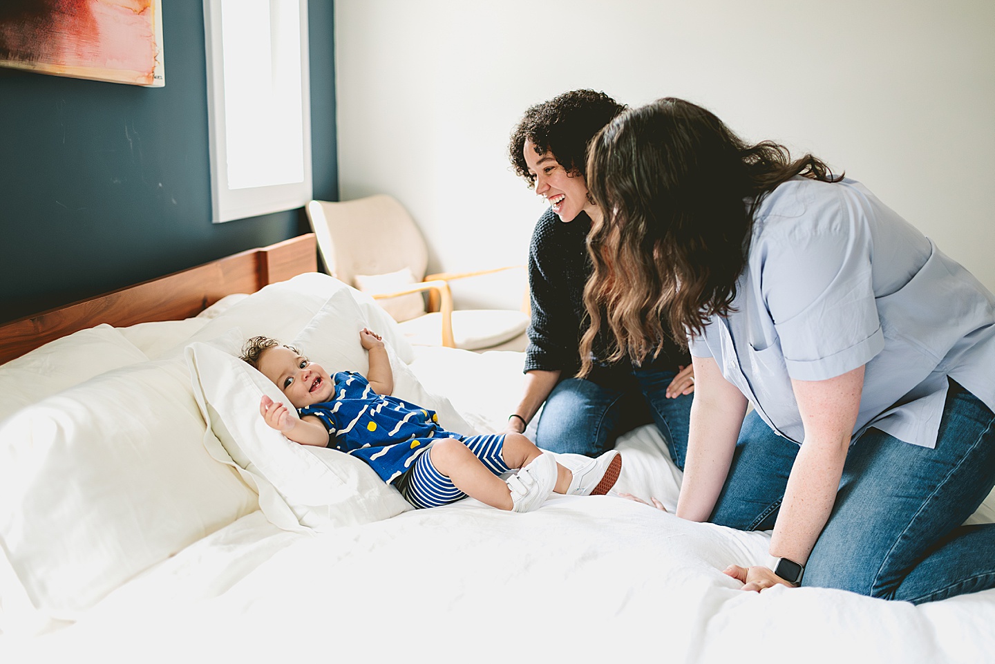 Toddler at home with moms