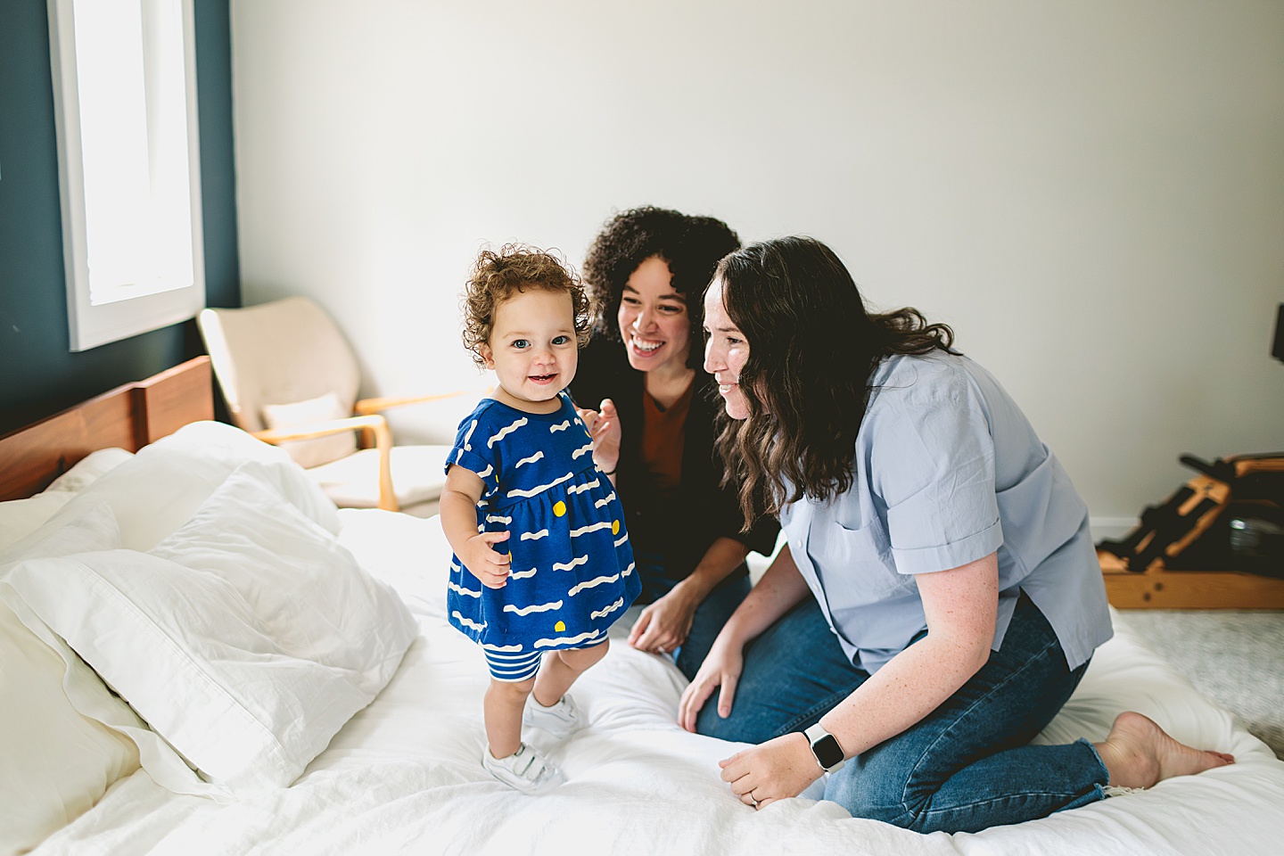 Toddler at home with moms