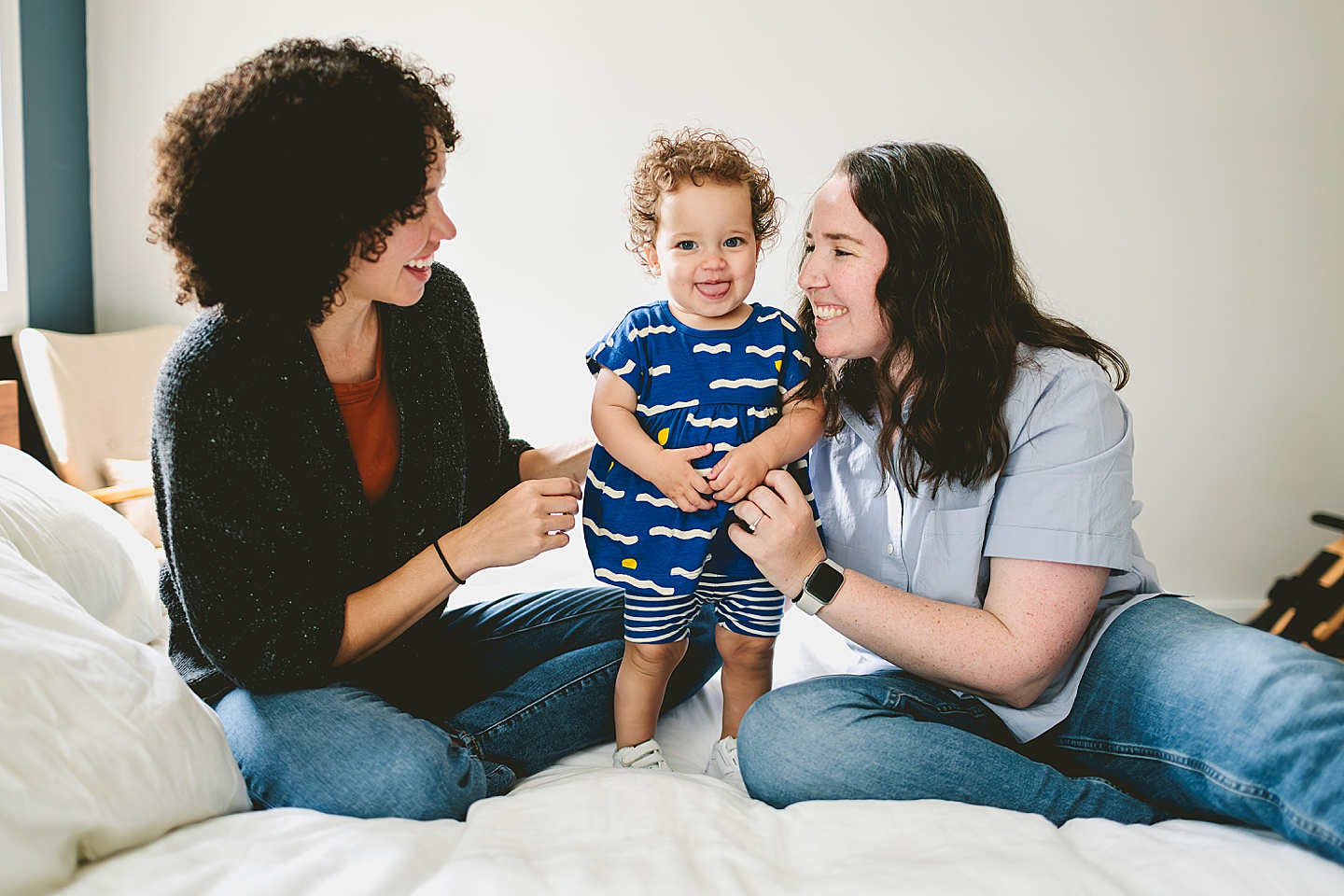 Toddler at home with moms