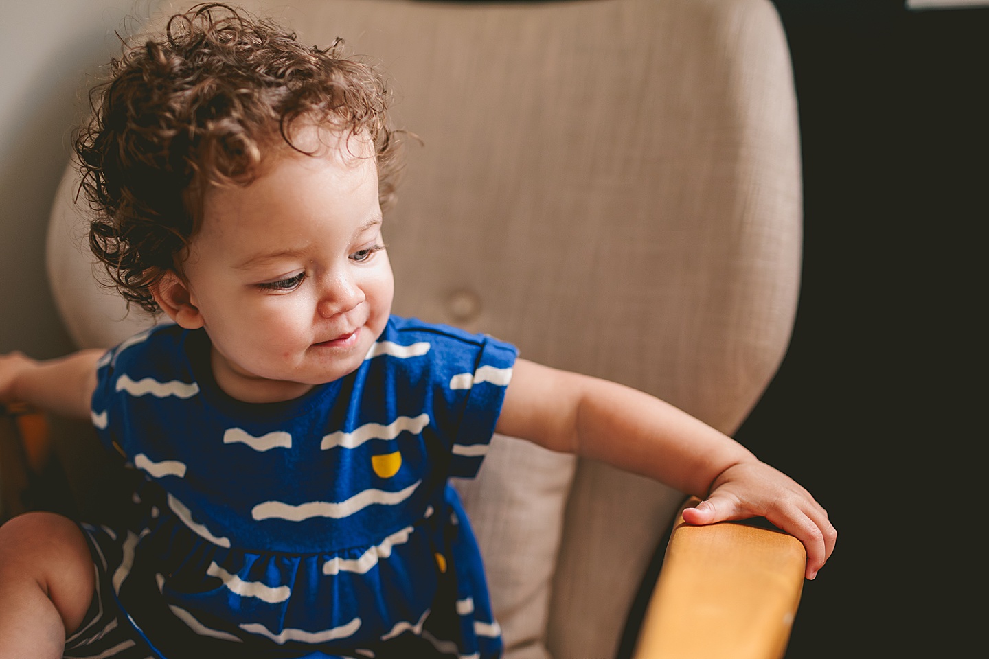 Toddler sitting in chair