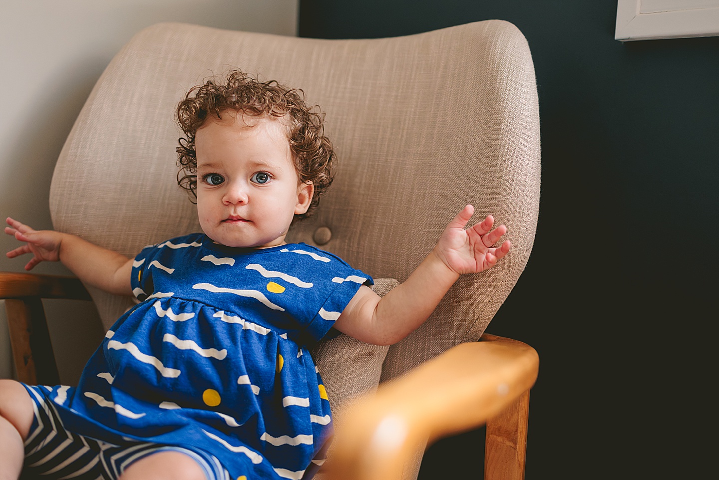 Toddler sitting in chair