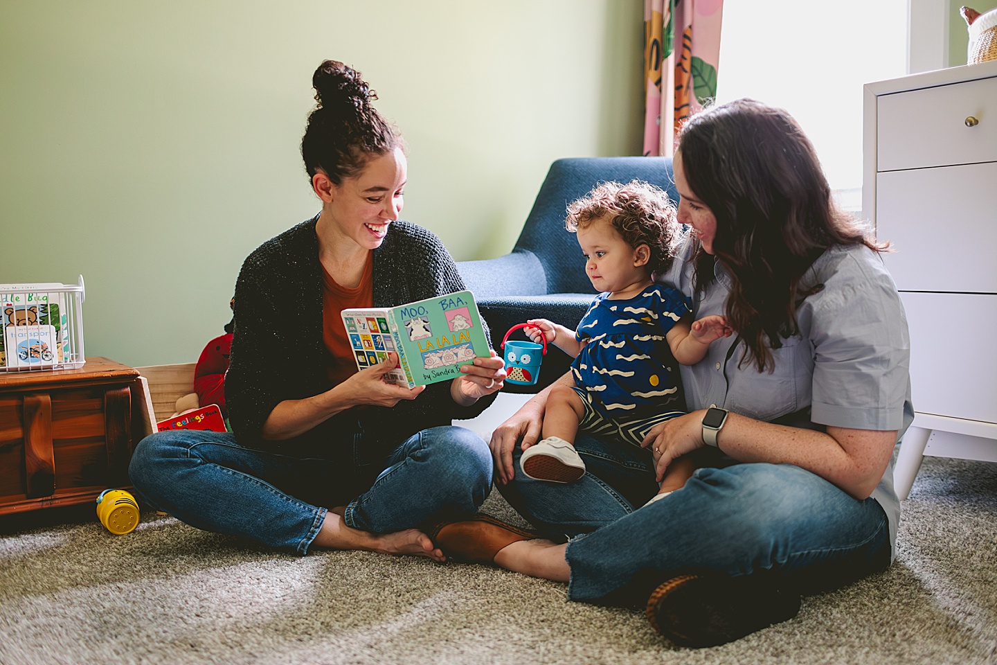 Moms reading to daughter