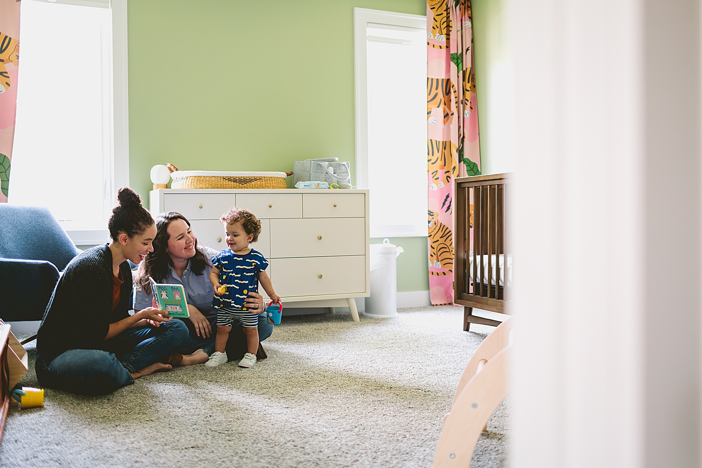 Moms reading to daughter