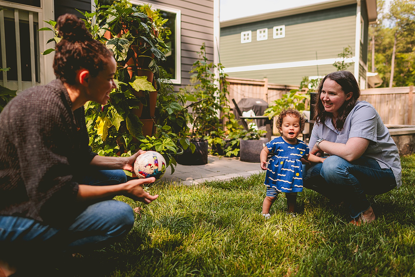 Toddler walking around garden