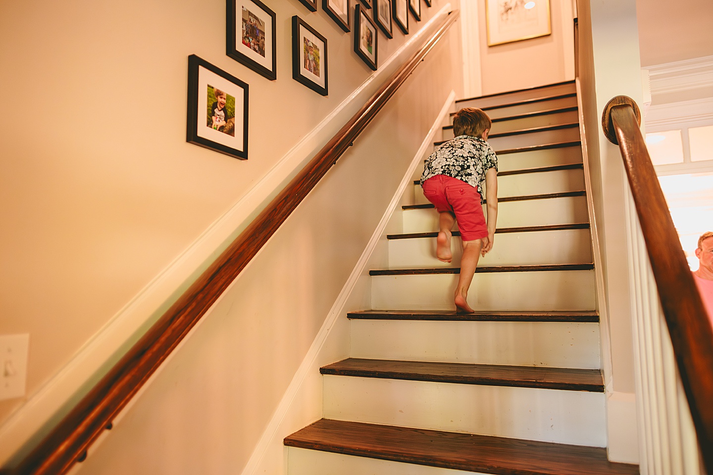 Kid running up the stairs