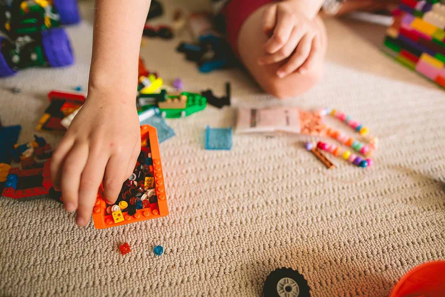 Kid playing with Legos