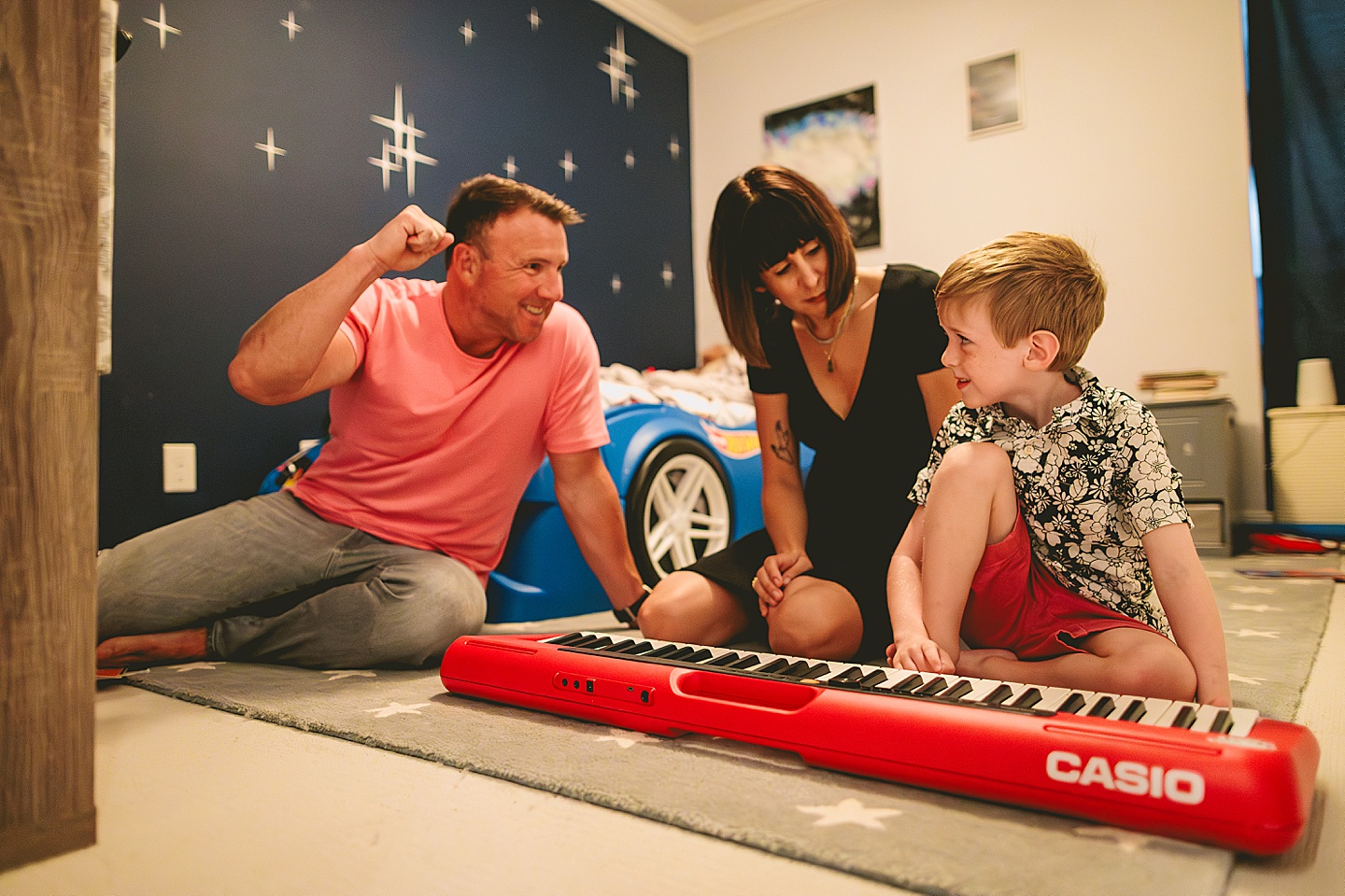 Boy playing a Casio keyboard